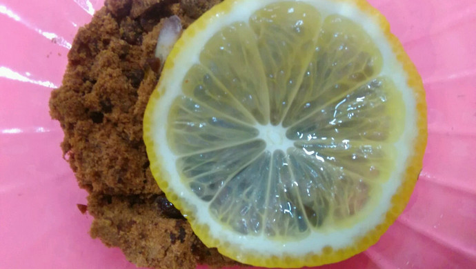 Dark dish brown sugar pickled lemon