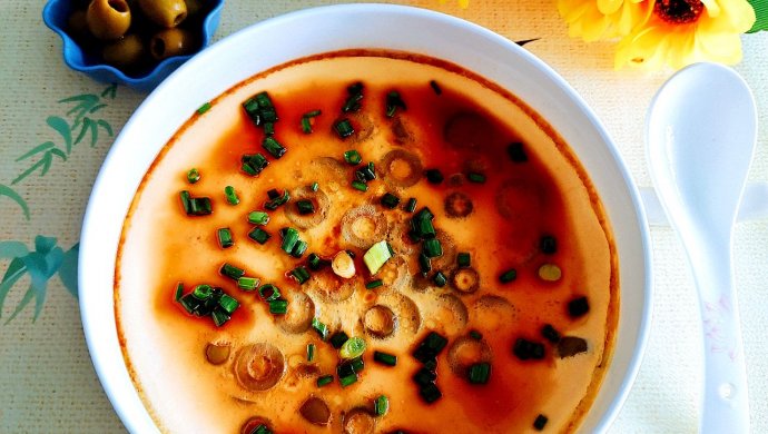 Steamed eggs with Spanish green olives